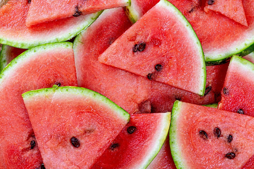 Fresh ripe watermelon slices background Fresh ripe watermelon slices background