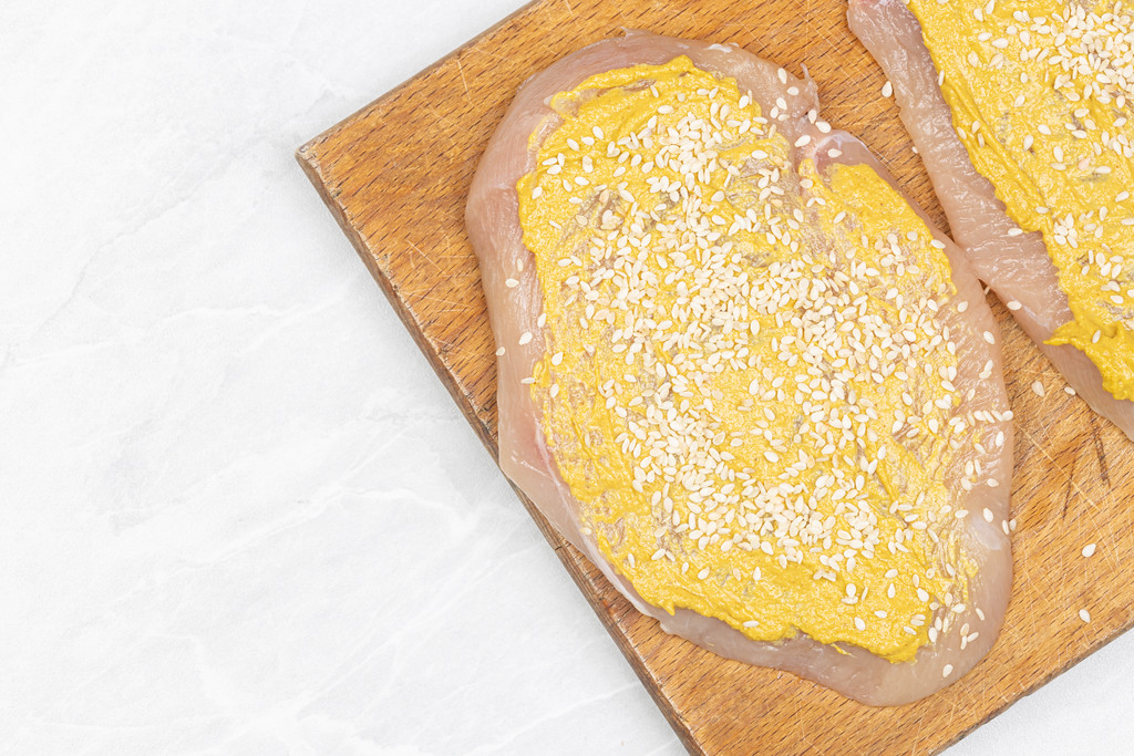 Chicken breasts prepared with Mustard and Sesame Chicken breasts prepared with Mustard and Sesame