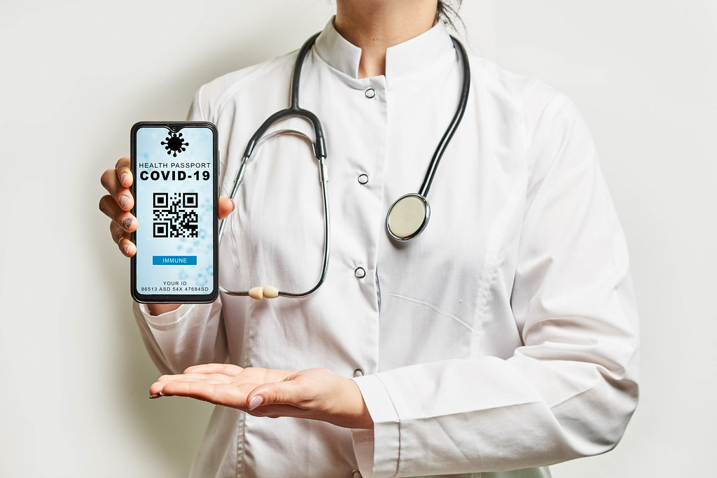 Healthcare worker announcing new Digital health passport Healthcare worker announcing new Digital health passport