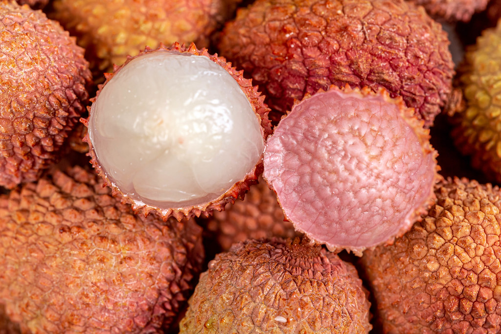 Juicy fresh lychees fruits background Juicy fresh lychees fruits background