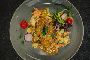 Beef steak sliced on a plate. Beef steak sliced on a plate.