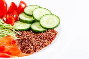 Brown rice with vegetables and micro greenery Brown rice with vegetables and micro greenery