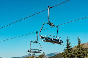 Chairlifts Against the Blue Sky at the Old Mountain, Serbia Chairlifts Against the Blue Sky at the Old Mountain, Serbia