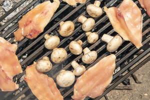 Chicken Breasts with Mushrooms on the barbecue grill Chicken Breasts with Mushrooms on the barbecue grill