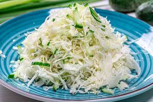 Close-up of fresh cabbage and cucumber salad Close-up of fresh cabbage and cucumber salad