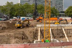 Construction workers with various construction machines at Rudolfplatz in Cologne Construction workers with various construction machines at Rudolfplatz in Cologne