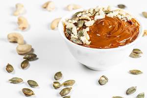 Dessert with condensed milk, cashew nuts and pumpkin seeds Dessert with condensed milk, cashew nuts and pumpkin seeds