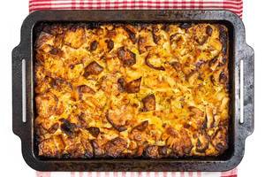Flat lay above freshly baked potatoes moussaka with minced meat Flat lay above freshly baked potatoes moussaka with minced meat