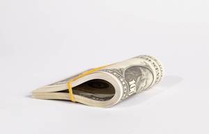 Folded hundred dollar bills Folded hundred dollar bills