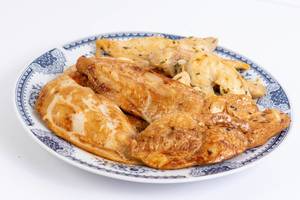 Grilled Chicken Breasts served on the plate Grilled Chicken Breasts served on the plate