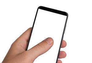Hand holding smartphone with blank screen on white background Hand holding smartphone with blank screen on white background