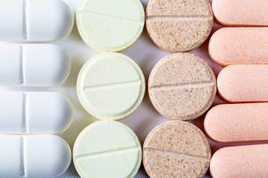 Heap of medicine pills. Background made from colorful pills and capsules Heap of medicine pills. Background made from colorful pills and capsules