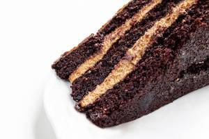 Homemade chocolate and cream cake, close up Homemade chocolate and cream cake, close up