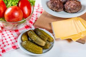 Homemade cutlets with fresh and pickled vegetables Homemade cutlets with fresh and pickled vegetables