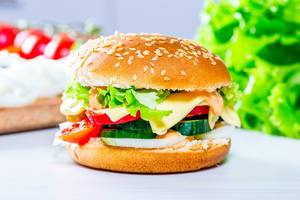 Homemade hamburger with lettuce and cheese Homemade hamburger with lettuce and cheese