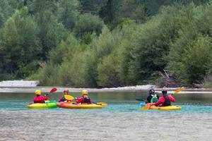 Kayaking on the Soca river, Slovenia Kayaking on the Soca river, Slovenia