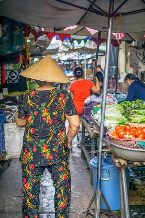 Local Vietnamese Woman at a Market in Chinatown Saigon Local Vietnamese Woman at a Market in Chinatown Saigon