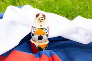 Matryoshka with a ball on the Russian flag Matryoshka with a ball on the Russian flag