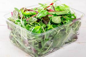 Mix salad leaves with spinach, chard, lettuce and rucola Mix salad leaves with spinach, chard, lettuce and rucola