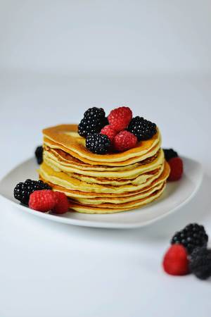 Pancakes with fresh wild Blackberries and Raspberries Pancakes with fresh wild Blackberries and Raspberries