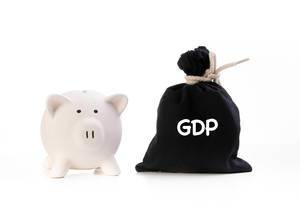 Piggy bank and money bag with GDP text on white background Piggy bank and money bag with GDP text on white background