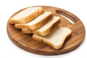 Pile of Toast bread on the round kitchen board Pile of Toast bread on the round kitchen board