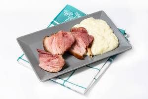 Served baked delicious Pork Knuckle on the plate Served baked delicious Pork Knuckle on the plate