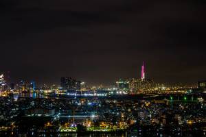 Skyline Night View of Saigon with Saigon River and Landmark 81 Skyline Night View of Saigon with Saigon River and Landmark 81