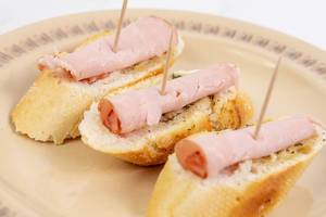 Sliced Baguettes served with pork Ham Sliced Baguettes served with pork Ham