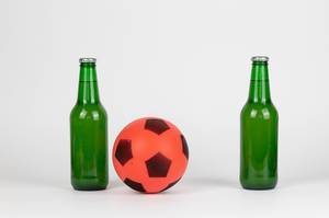 Soccer ball and beer bottles Soccer ball and beer bottles