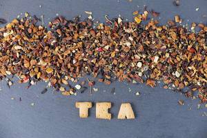 Tea biscuits and dry tea leaves Tea biscuits and dry tea leaves