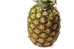Whole Pineapple on the white background with copy space Whole Pineapple on the white background with copy space