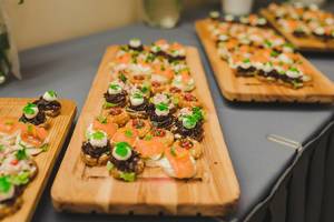 Wood Plates Of Salmon, Pork and Cream Canapes (Flip 2019) Wood Plates Of Salmon, Pork and Cream Canapes (Flip 2019)