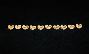 wooden love hearts on black background wooden love hearts on black background