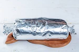 Wrapped in foil roll of biscuit Wrapped in foil roll of biscuit